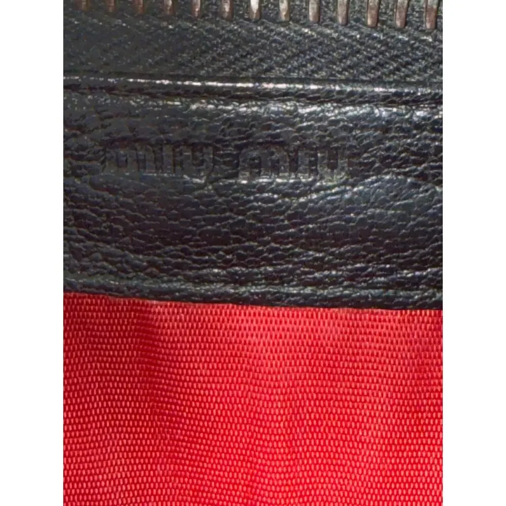 Miu Miu Black Leather Studded Bow Zip Wallet – Red Jewels, Gold Hardware, Italy